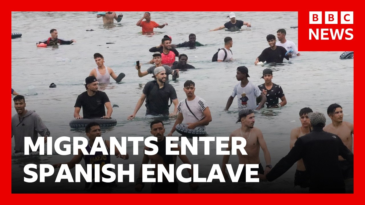 Thousands of migrants try to enter Spanish enclave of Ceuta from Morocco | BBC News