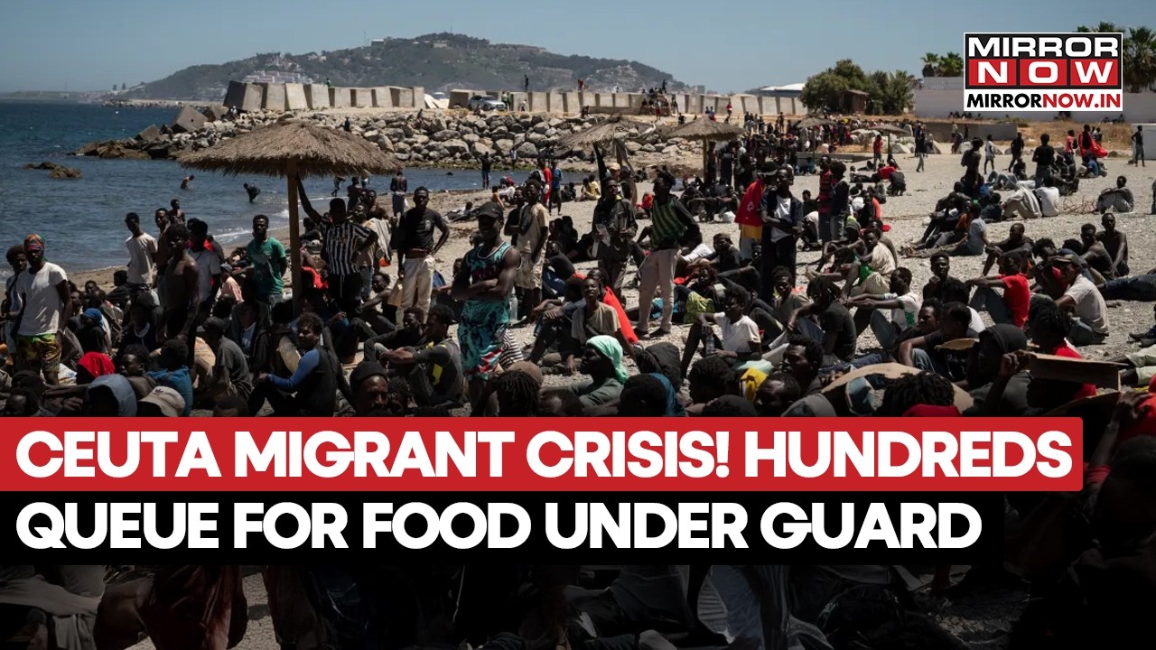 Ceuta Crisis! Hundreds Of Migrants Queue For Food Under Heavy Police Guard | WATCH